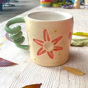 In the garden hand carved mug